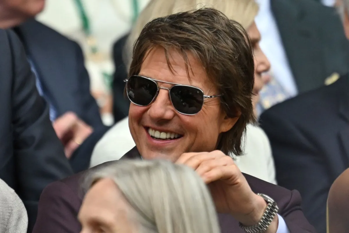 توم كروز في نادي All England Lawn Tennis and Croquet في ويمبلدون جنوب غرب لندن (Tom Cruise at The All England Lawn Tennis and Croquet Club in Wimbledon, southwest London). مصدر الصورة: ANDREJ ISAKOVIC / AFP