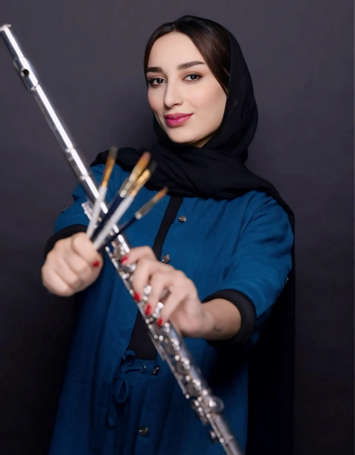 حسناء العجمي عازفة الفلوت- تصوير سعيد الزدجالي