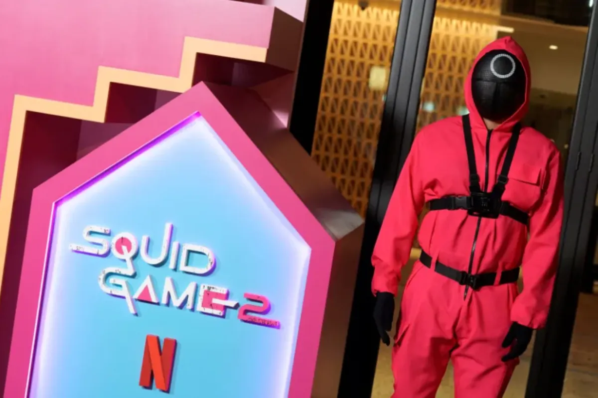 لعبة الحبار Squid Game - (Photo by Presley Ann / GETTY IMAGES NORTH AMERICA / Getty Images via AFP)