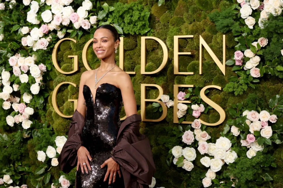 زوي سالدانا في حفل توزيع جوائز غولدن غلوب ال82 (Zoe Saldana at the 82nd annual Golden Globe Awards ). مصدر الصورة:Etienne Laurent / AFP