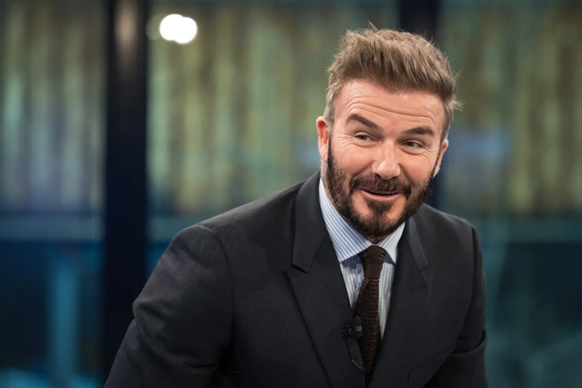 ديفيد بيكهام في المنتدى الاقتصادي العالمي في دافوس (  David Beckham at the World Economic Forum in Davos). مصدر الصورة: FABRICE COFFRINI / AFP