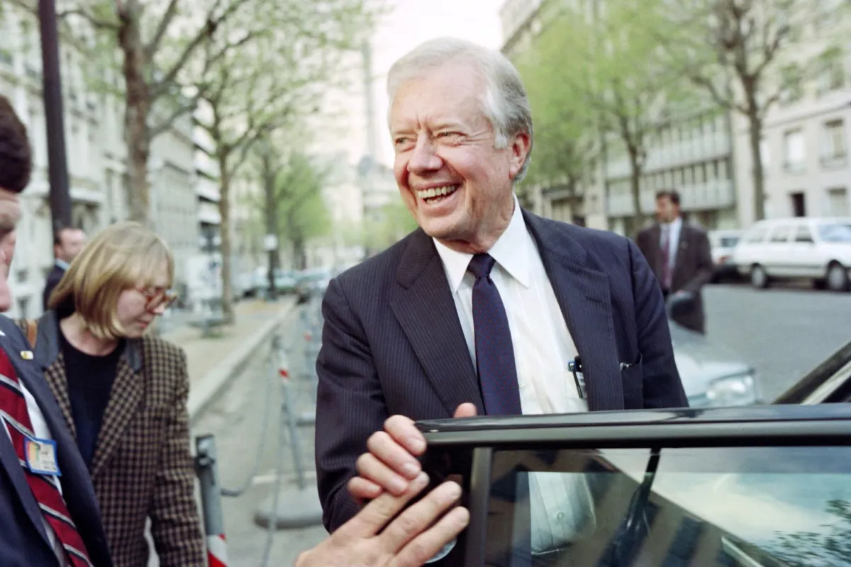 جيمي كارتر في قصر الإليزيه الرئاسي (Jimmy Carter at Elysee presidential palace). مصدر الصورة: Patrick HERTZOG / AFP