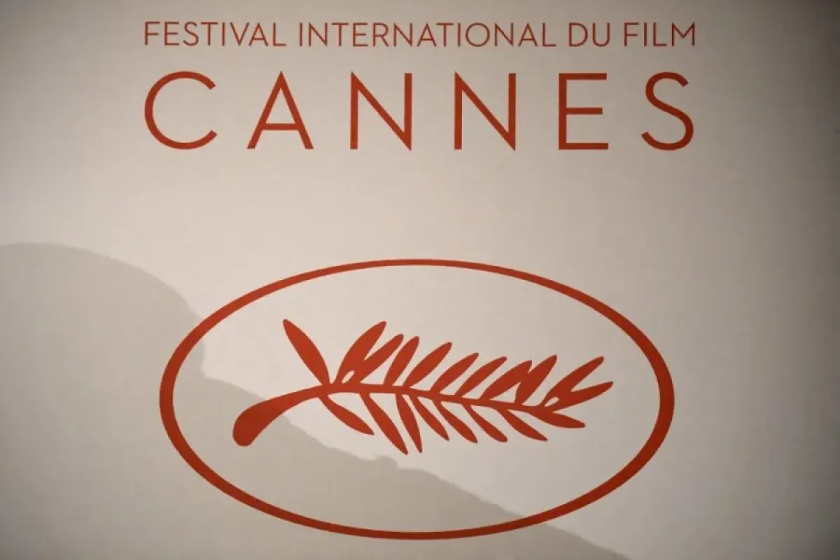 شعار مهرجان كان السينمائي الدولي (The logo of the International Cannes Film Festival). مصدر الصورة: Lionel BONAVENTURE / AFP