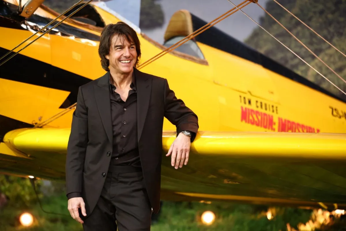 توم كروز في حدائق ليستر سكوير في وسط لندن (Tom Cruise at Leicester Square Gardens in central London). مصدر الصورة: HENRY NICHOLLS / AFP