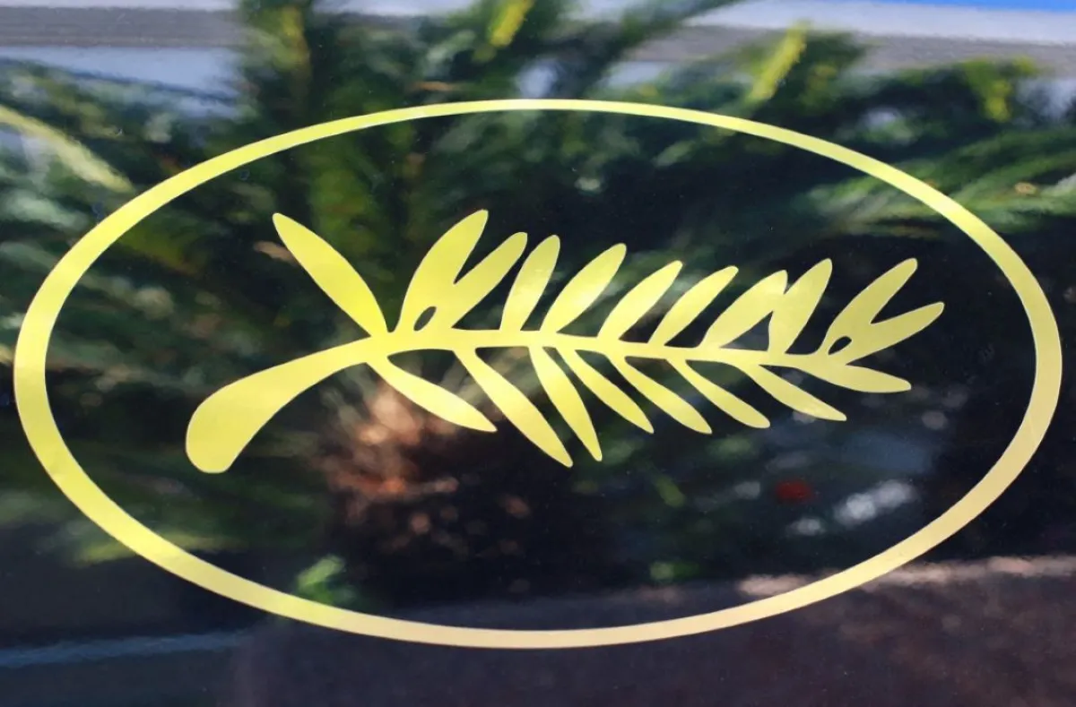 شعار مهرجان كان – مصدر الصورة LOIC VENANCE / AFP