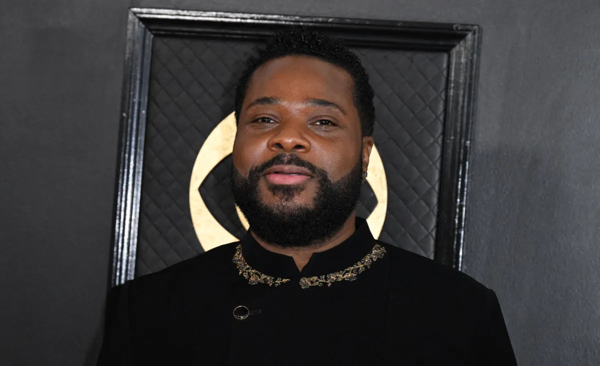 مالكولم جمال وارنر في حفل توزيع جوائز غرامي ( Malcolm-Jamal Warner at the Grammy Awards ). مصدر الصورة: Robyn BECK / AFP