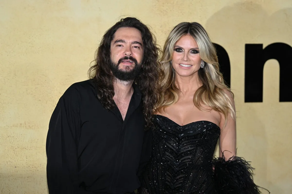 هايدي كلوم Heidi Klum  مع زوجها توم كاوليتز Tom Kaulitz  على السجادة الحمراء لمهرجان كان -  مصدر الصورة Julie SEBADELHA / AFP