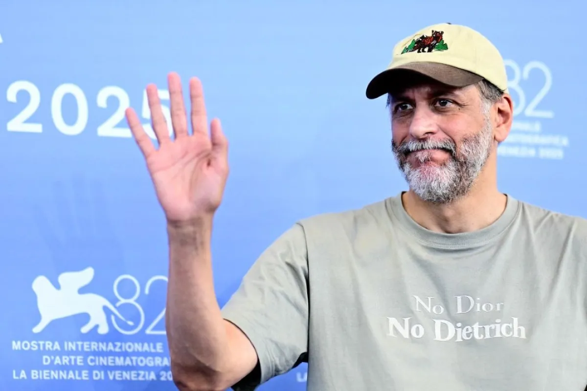 المُخرج لوكا غوادينينو Italian film director Luca Guadagnino (Photo by Tiziana FABI / AFP)