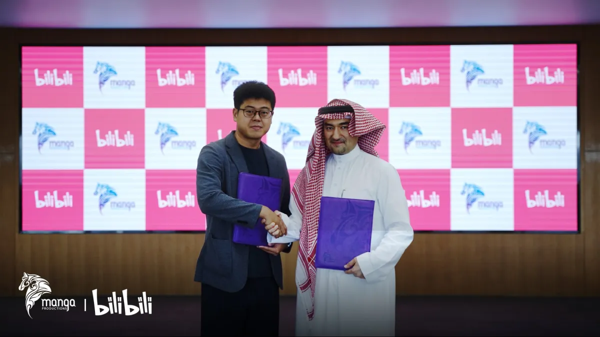 الدكتور عصام بخاري، الرئيس التنفيذي لشركة مانجا للإنتاج وتشانغ شينغيان، نائب رئيس شركة بيلي بيلي. الصورة من الحساب الرسمي لمانجا للإنتاج على منصة x