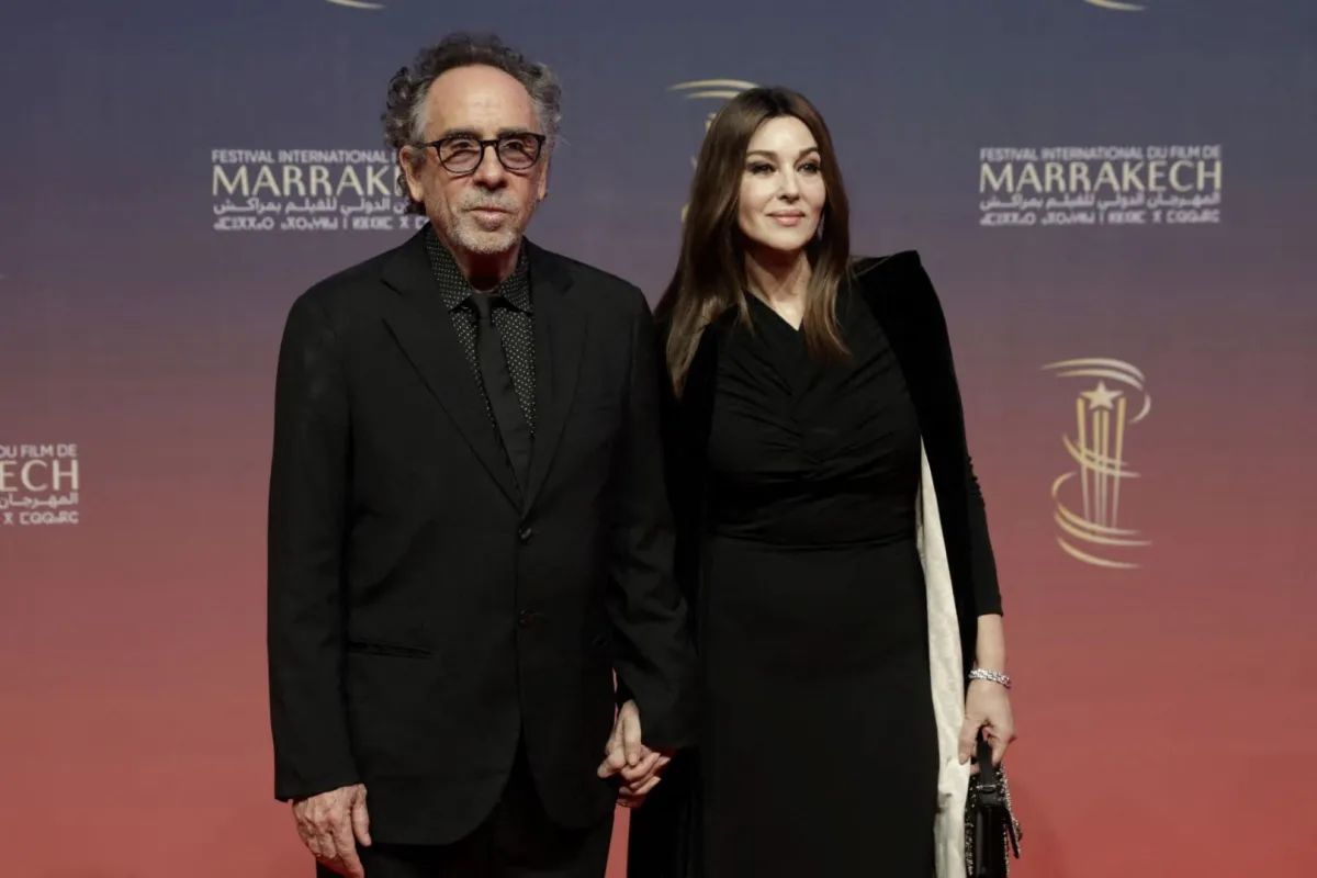 مونيكا بيلوتشي وتيم بيرتون Monica Bellucci and Tim Burton، من مهرجان مراكش السينمائي الدولي 2024. مصدر الصورة: AFP