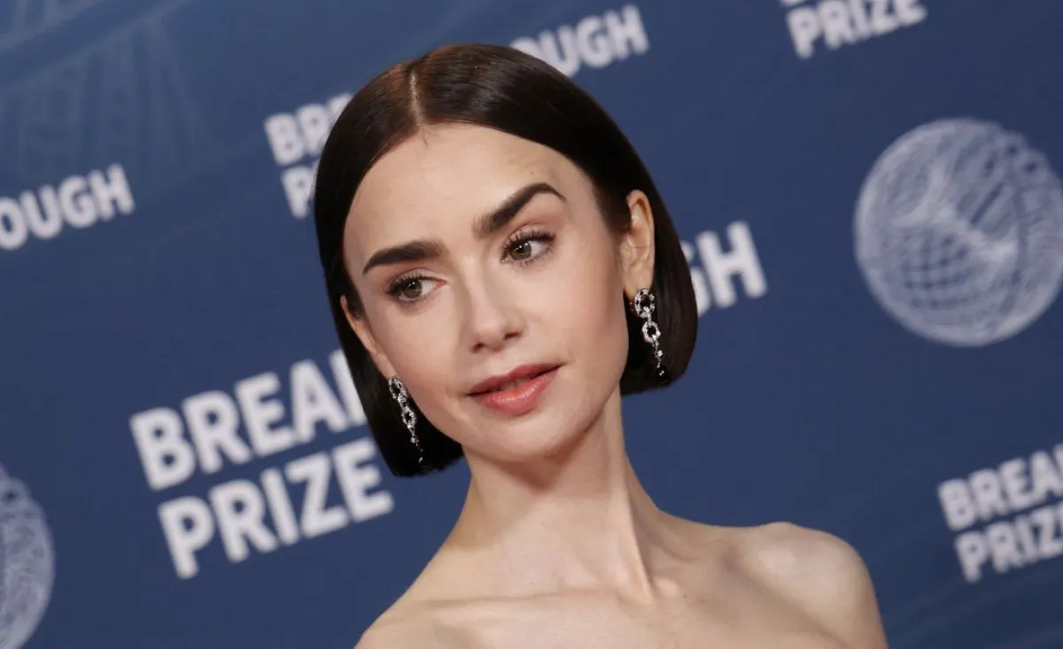 ليلي كولينز - Lily Collins (Photo by Michael Tran / AFP)