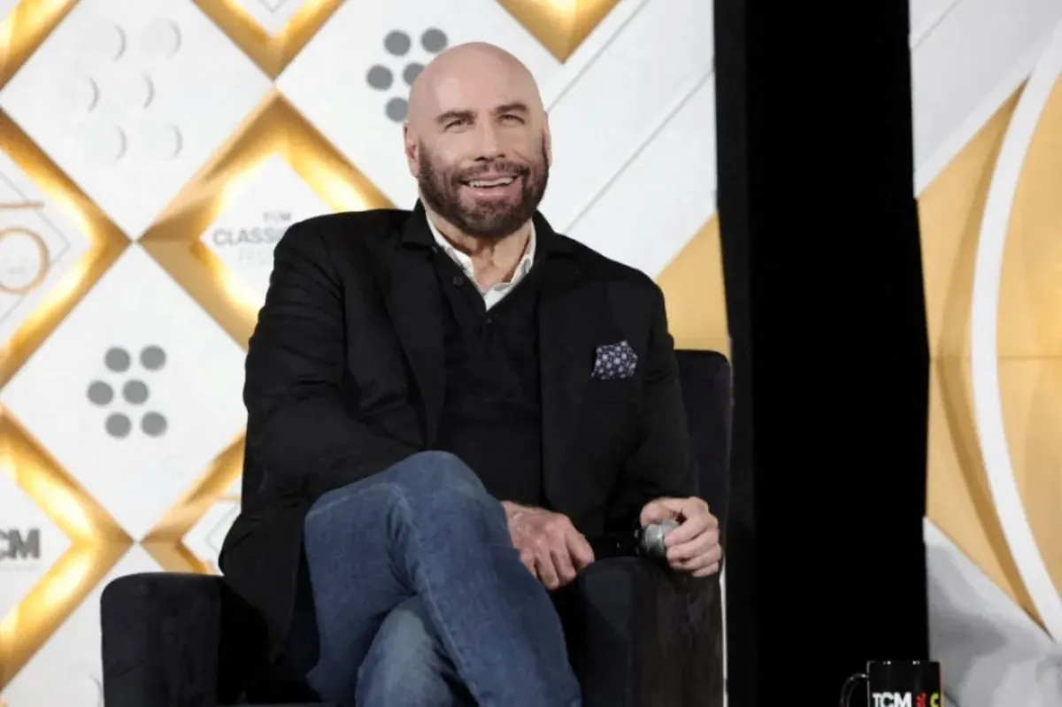 جون ترافولتا في مسرح تي سي إل الصيني في هوليوود، كاليفورنيا (John Travolta at TCL Chinese Theatre in Hollywood, California). مصدر الصورة: Emma McIntyre/Getty Images for TCM/AFP