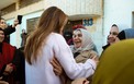 ترحيب سيدات الجمعية بالملكة رانيا.jpg