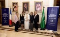 صورة تذكارية من فعالية اليوم العالمي للمرأة في سفارة السعودية بباريس.