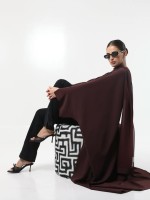 عباية خوخية من علامة Ao By Asma- الصورة من حساب الدار على إنستغرام