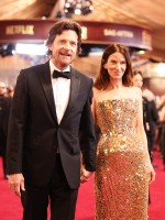 الممثل الأمريكي جيسون بيتمان وزوجته الممثلة أماندا أنكا خلال حضورهما حفل توزيع جوائز الأوسكار الـ98 - مصدر الصورة VALERIE MACON / AFP