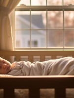 صورة لمولود نائم في سريره