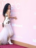 النجمة تيانا تايلورTeyana Taylor في حفل بيلبورد للموسيقى Billboard Women in Music - (مصدر الصورة  VALERIE MACON / AFP)