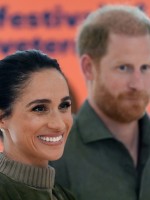 الأمير هاري (Prince Harry) وزوجته ميغان ماركل (Meghan Markle)- Photo by Jonathan Brady / POOL / AFP