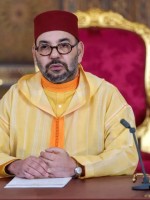 الملك محمد السادس من القصر الملكي شمال شرق مدينة فاس (King Mohammed VI from the Royal Palace in the northeastern city of Fez). مصدر الصورة: Moroccan Royal Palace / AFP