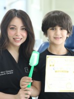 صورة د. ريما زمعيش مع الطفل آرام