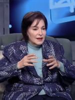 نادية رشاد - الصورة من شاشة عرض أحد البرامج