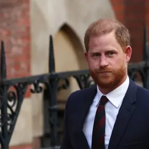 الأمير هاري خلال زيارته إلى بريطانيا ( Prince Harry during his visit to Britain ). مصدر الصورة:HENRY NICHOLLS / AFP