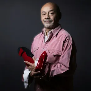المصمم كريستيان لوبوتان Christian Louboutin- (مصدر الصورة JOEL SAGET / AFP)