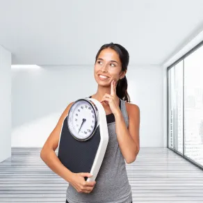 امرأة تحمل ميزاناً امرأة تحمل ميزاناً