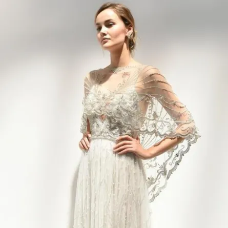 فساتين زفاف بأكمام شفّافة لـ عروس ربيع 2018