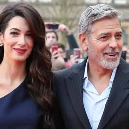 جورج كلوني وزوجته أمل علم الدين - الصورة من موقع The News International