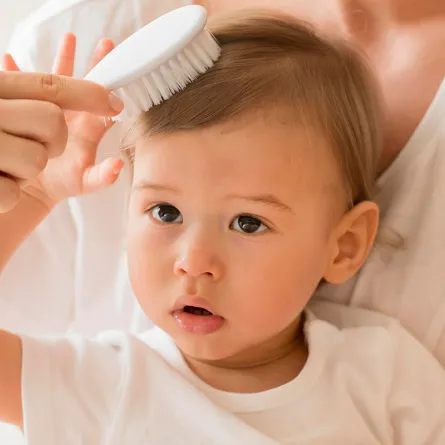 فوائد زيت جوز الهند لشعر الأطفال الرضع