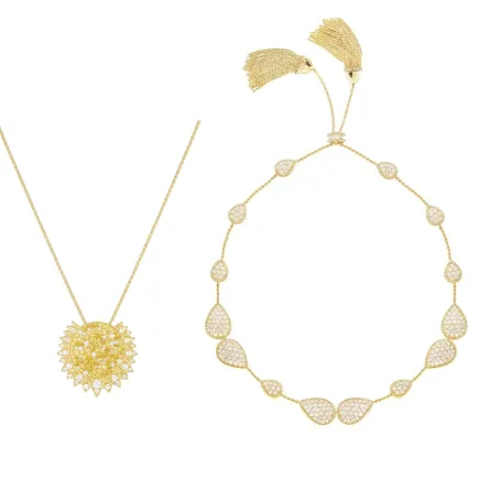 قلادات ذهب أصفر مرصعة بالألماس لإطلالة ناعمة لعروس 2022