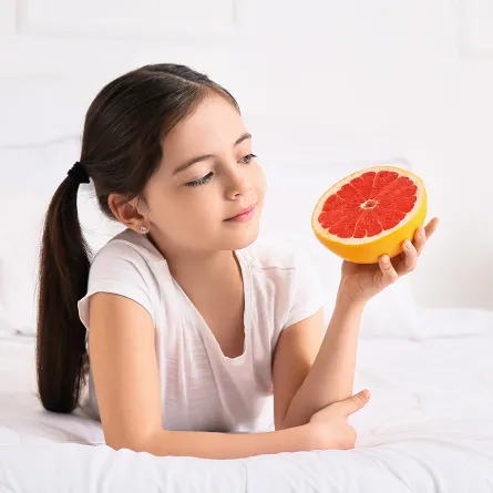 فوائد تناول طفلك الجريب فروت، وما هي الاحتياطات الواجب اتخاذها؟