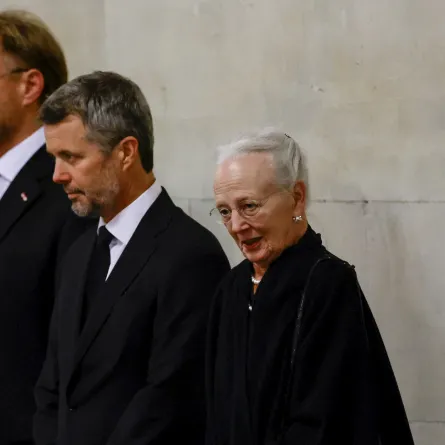 Queen Margrethe II of Denmark (R) and Crown Prince Frederik (C) pay their respects to the coffin of Queen Elizabeth II, Lying in State inside Westminster Hall, at the Palace of Westminster in London on September 18, 2022. Britain was gearing up Sunday for the momentous state funeral of Queen Elizabeth II as King Charles III prepared to host world leaders and as mourners queued for the final 24 hours left to view her coffin, lying in state in Westminster Hall at the Palace of Westminster. SARAH MEYSSONNIER /
