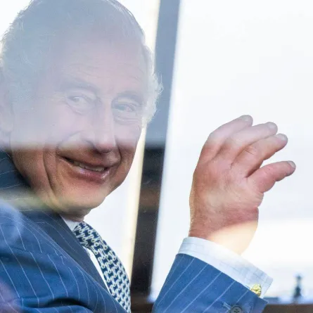   Britain's King Charles III waves from the car as he leaves after meeting with members and staff of the association "Project Zero", an organisation dedicated to engaging young people in positive activities, promoting social inclusion and strengthening community cohesion, during a visit of the center in Walthamstow, in east London, on October 18, 2022. Paul Grover / POOL / AFP