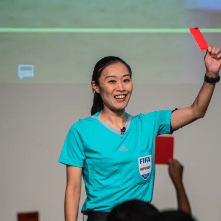 Japan's first female professional referee Yoshimi Yamashita attends a public event before a press conference in Japan football museum in Tokyo on August 1, 2022. Philip FONG / AFP
