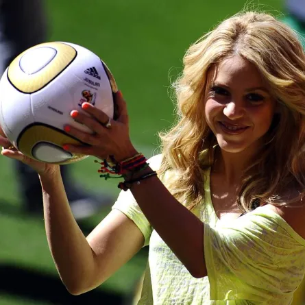 Colombia's singer Shakira, holding the Jo'bulani football that will be used for the final of the tournament, poses after a press conference on July 10, 2010 at Soccer City Stadium in Soweto, suburb of Johannesburg, on the eve of the 2010 Football World Cup final between The Netherlands and Spain. South Africa basked today in the success of its trouble-free World Cup, as finishing touches were put to the closing ceremony with superstar Shakira and a herd of giant elephant puppets. AFP PHOTO / STEPHANE DE SAK