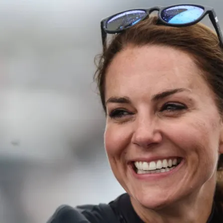 Britain's Catherine, Duchess of Cambridge, smiles as she joins the British team aboard of their F50 foiling catamaran to take part in a friendly "Commonwealth Race" against their New Zealand rivals, ahead of the final day of the Great Britain Sail Grand Prix, during a visit in Plymouth, on July 31, 2022.Jeff Gilbert / POOL / AFP