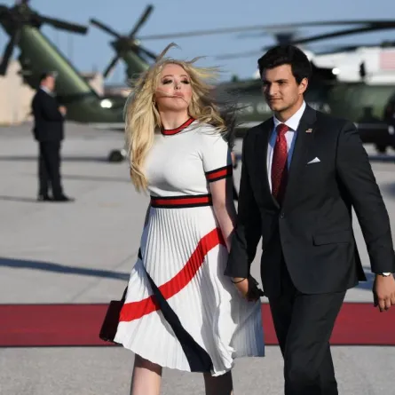 Daughter of the US president Tiffany Trump (L) and boyfriend Michael Boulos arrive at Ellsworth Air Force Base in South Dakota, July 3, 2020, as they travel to view Independence Day fireworks at Mount Rushmore. SAUL LOEB / AFP