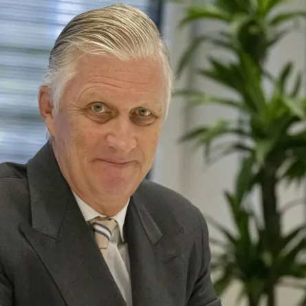 King Philippe of Belgium looks on during a visit at the BioNTeCH research institute in Mainz, Rhineland-Palatinate, western Germany, on October 5, 2022. ANDRE PAIN / AFP