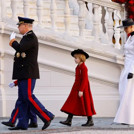 Prince Albert II of Monaco (L), Princess Gabriella and Princess Charlene of Monaco attend celebrations as part of ceremonies marking the National Day at the Palace in Monaco on November 19, 2022. ERIC GAILLARD / POOL / AFP