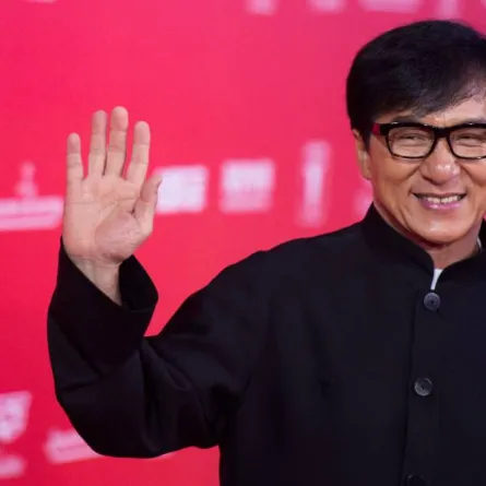 Hong Kong actor Jackie Chan poses on the red carpet during the opening ceremony of the Shanghai International Film Festival (SIFF) in Shanghai on June 13, 2015. The 18th Shanghai International Film Festival runs from June 13 to 21. AFP PHOTO / JOHANNES EISELE JOHANNES EISELE / AFP