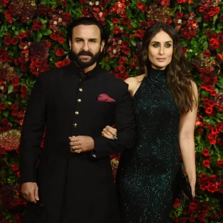 Indian Bollywood actors Saif Ali Khan (L) and Kareena Kapoor Khan (R) pose for a picture during the wedding reception party of actors Ranveer Singh and Deepika Padukone in Mumbai late on December 1, 2018. AFP