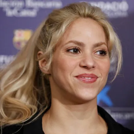 Colombian singer and founder of Colombian NGO, Fundacion Pies Descalzos, Shakira Mebarak, poses at the Camp Nou stadium in Barcelona on March 28, 2017 during the presentation of the project to build a new school in the restive region of Barranquilla (Colombia), in collaboration with the foundations of FC Barcelona and La Caixa. PAU BARRENA / AFP