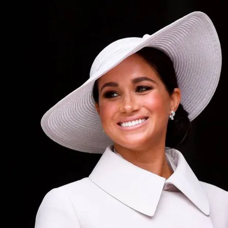 Britain's Meghan, Duchess of Sussex, smiles at the end of the National Service of Thanksgiving for The Queen's reign at Saint Paul's Cathedral in London on June 3, 2022 as part of Queen Elizabeth II's platinum jubilee celebrations. TOBY MELVILLE / POOL / AFP