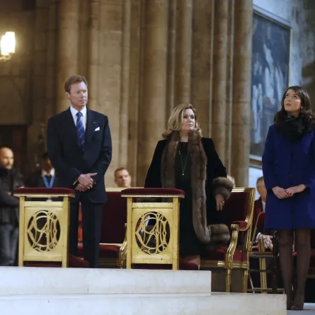 The Grand-Duke Henri of Luxembourg (L), his wife Grand-Duchess Maria Teresa (C), and their daughter Princess Alexandra (R) at Paris' Notre-Dame de Paris Cathedral on February 2, 2013 in Paris. AFP PHOTO / FRANCOIS GUILLOT FRANCOIS GUILLOT / AFP