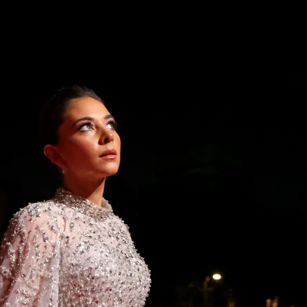  Fatima al-Banawi arriving on the red carpet during  the first edition of the Red Sea Film Festival in Saudi Arabia's Red Sea coastal city of Jeddah on December 13, 2021.PATRICK BAZ / Red Sea Film Festival / AFP