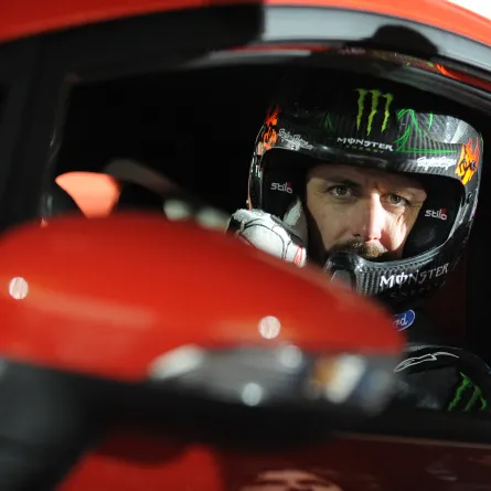 In this file photo taken on March 24, 2013, US driver Ken Block poses for a photo in a Ford Fiesta ST type car on ice of Budapest City Park Ice Rink  GERGELY BESENYEI / AFP
