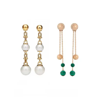 موديلات أقراط متدلية مع أحجار كروية لإطلالة عصرية في شتاء 2023